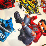 Ultra 9 Color ORGB DTF transfers showcasing vibrant artwork and sneaker designs on custom apparel.