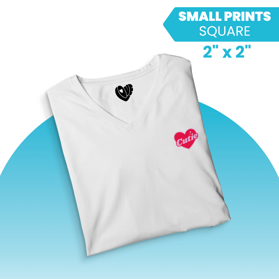 Custom DTF Transfers by Size on a white V-neck t-shirt featuring a heart design with the word "Cutie".