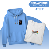Custom DTF Transfers by Size - Small prints on a blue hoodie and white v-neck t-shirt featuring vibrant designs.