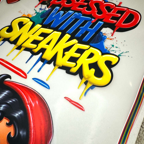 Ultra 9 Color ORGB DTF transfers showcasing vibrant print, featuring the phrase 'Obsessed with Sneakers'.