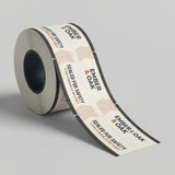 Roll of Ember & Oak branded tape on a gray background