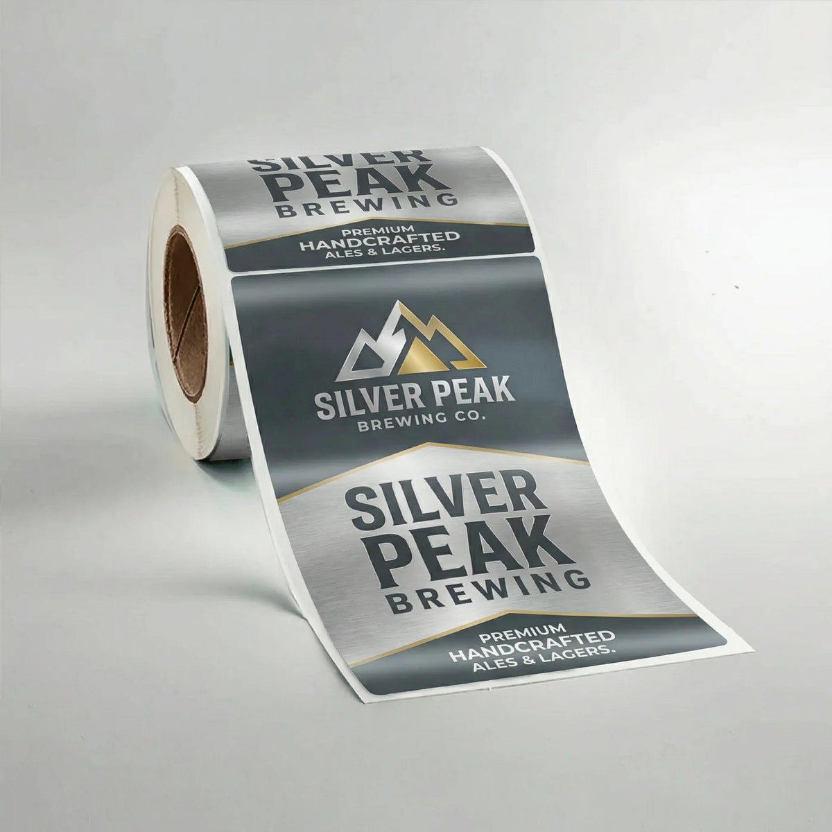 Roll of Silver Peak Brewing Company labels on a gray background