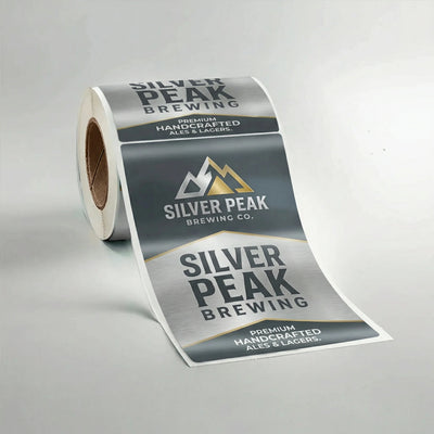 Roll of Silver Peak Brewing Company labels on a gray background