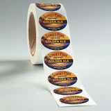 Roll of Sunset Cove Brewing Golden Ale labels on a gray background