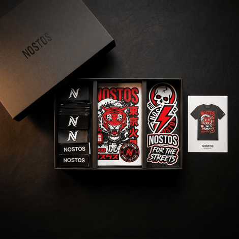 Nostos branded merchandise including t-shirts and stickers on a dark background