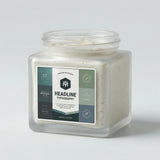 Jar of a white substance with a label on a gray background