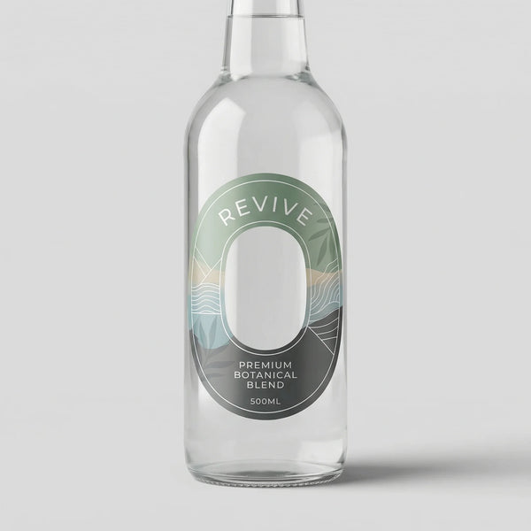 Clear glass bottle with a 'Revive' label on a light gray background