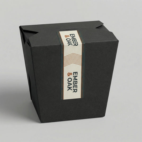 Black box with 'Ember & Oak' label on a gray background