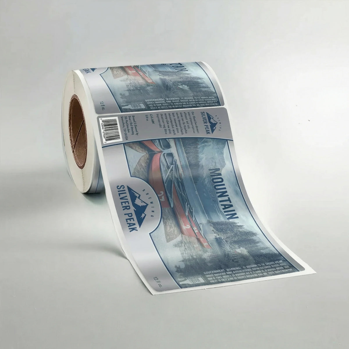 Roll of printed labels with 'Silver Peak' branding on a gray background