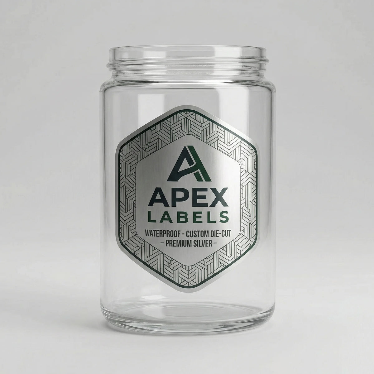 Clear glass jar with Apex Labels label on a white background