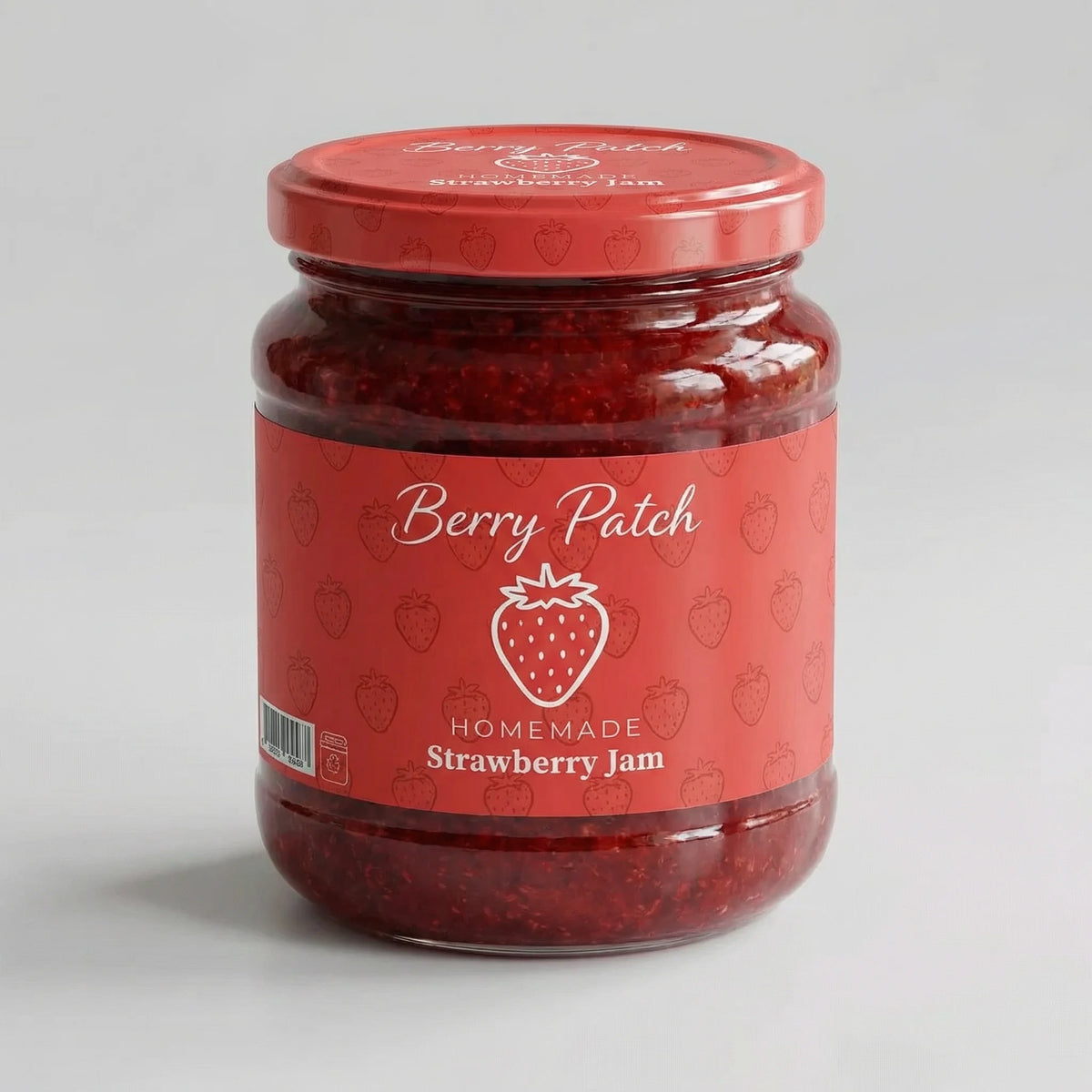 Jar of Berry Patch strawberry jam on a light gray background