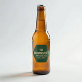 Bottle of 'The Brewmaster's Artisan Ale' on a light gray background