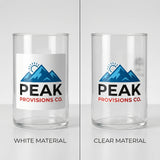 Two glass tumblers with Peak Provisions Co. logo, one on white and one on clear material.