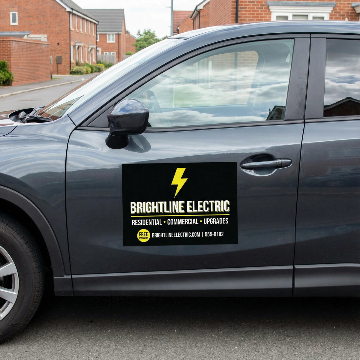 Car with Brightline Electric advertisement on a residential street