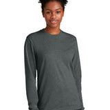 Next Level Apparel ®  Adult CVC Long Sleeve Tee NL6211 model wearing a gray long sleeve shirt.