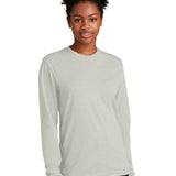 Next Level Apparel ®  Adult CVC Long Sleeve Tee NL6211 modeled by a woman wearing a light gray long sleeve shirt.