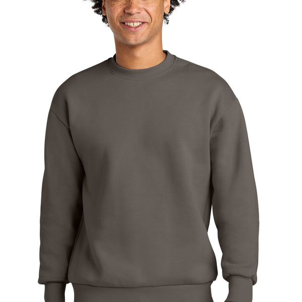 Next Level Apparel ®  Heavyweight Sweatshirt NL9007 displayed on a model wearing a gray sweatshirt.