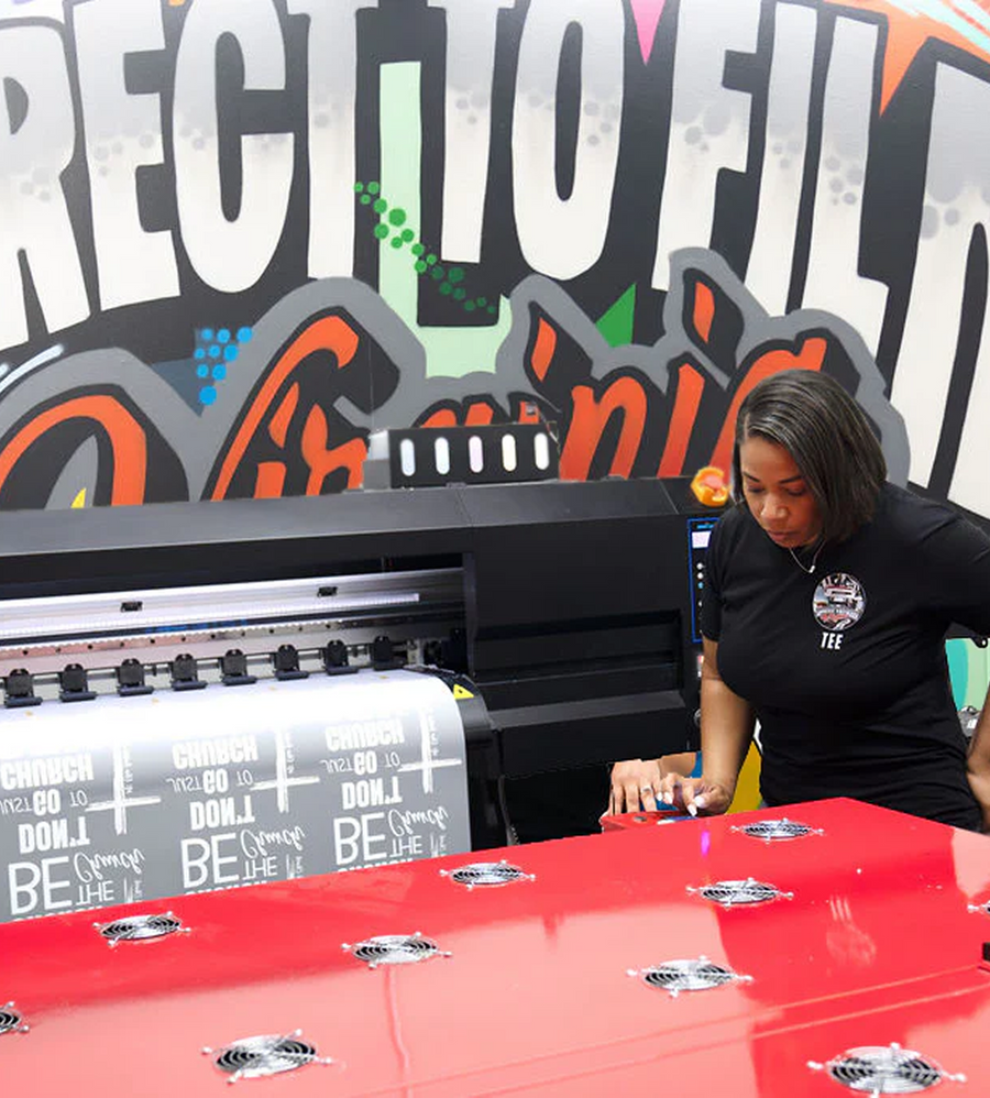 DTF transfers coming off the printer at DTF Virginia in Hampton, VA